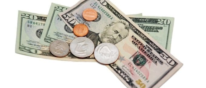 dollar bills and change