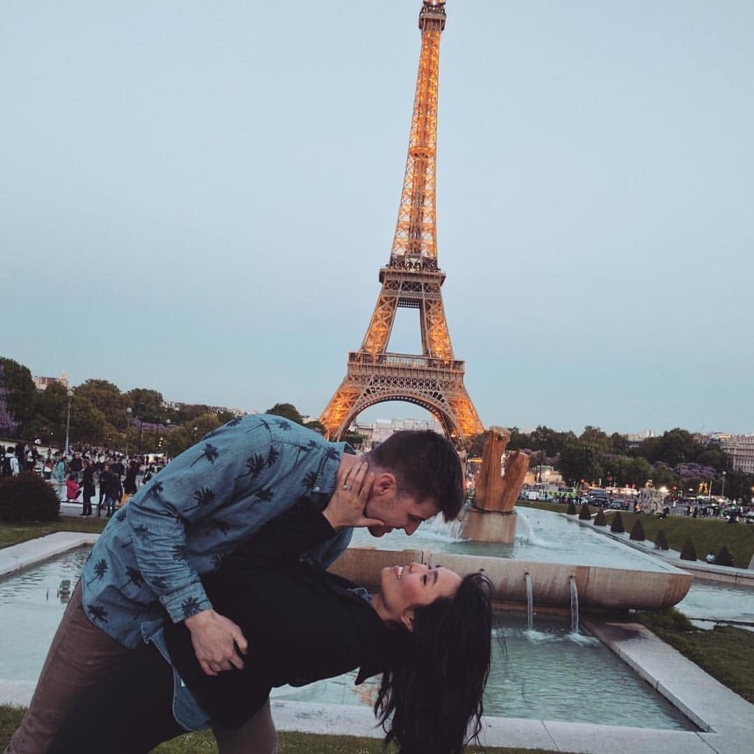 couple dipping in front of Eiffel tower