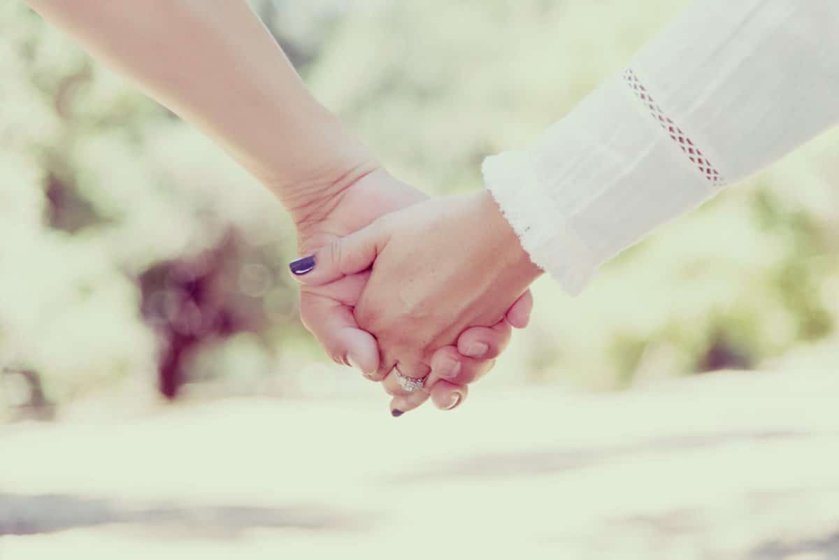 two females hands holding