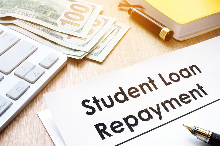 Student Loan Repayment Form On A Desk.