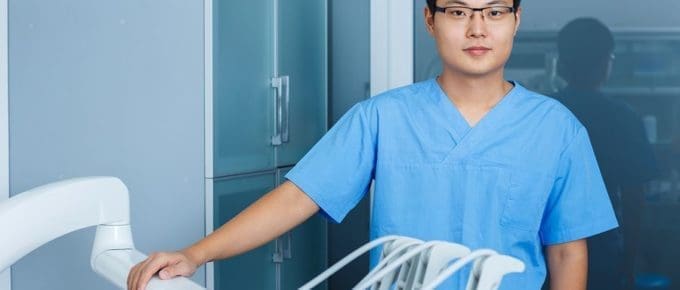 asian nurse at xray machine