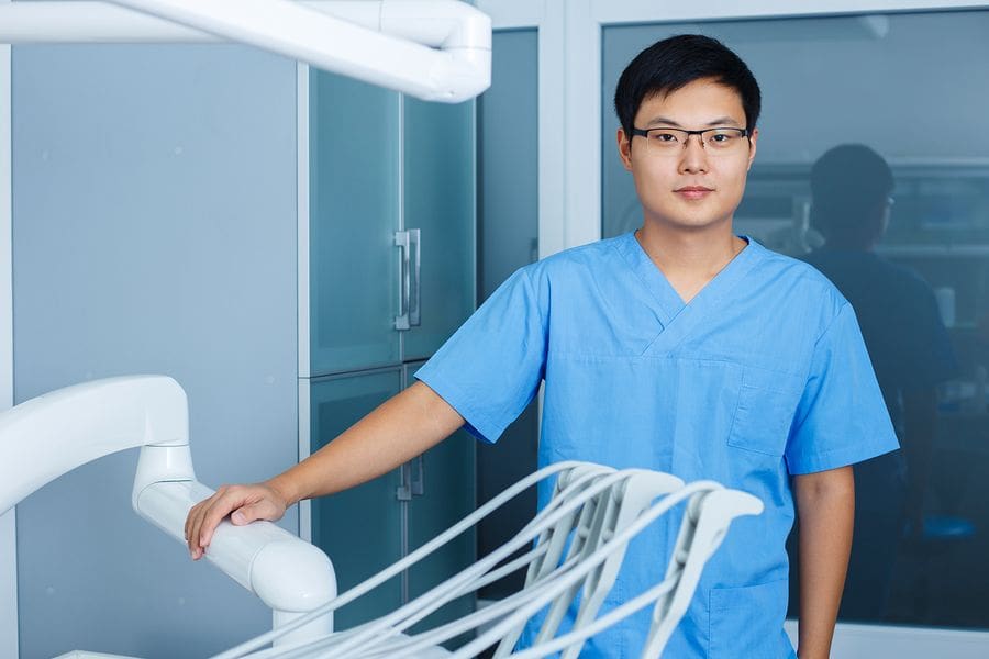 asian nurse at xray machine