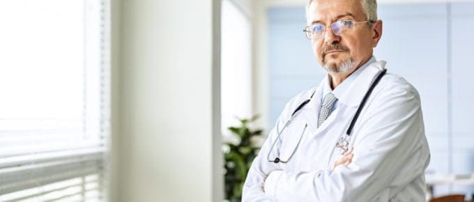 Male Physician Crossed Arms Posing