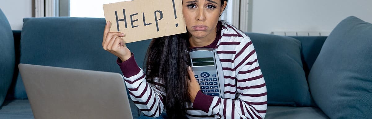 young woman stressed with help sign