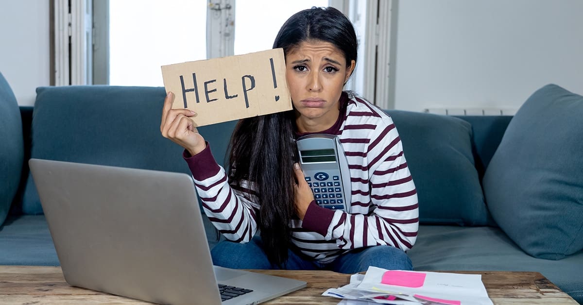 young woman stressed with help sign