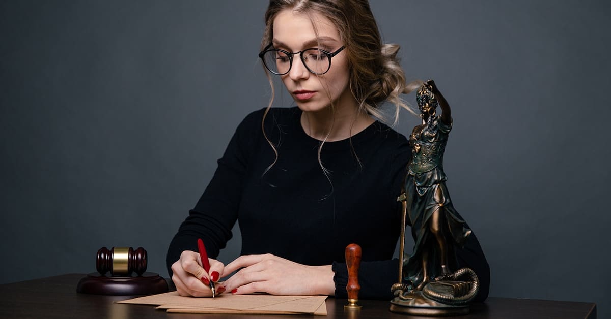 female lawyer working at desk