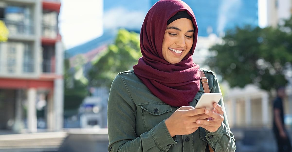 young-woman-texting-mobile-phone