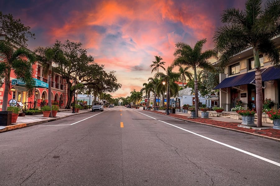Naples, Florida, USA - September 22, 2018: Sunrise over the Third Street shopping district in Old Naples, Florida.