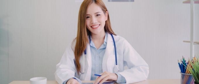 Asian Woman Physician Smiling