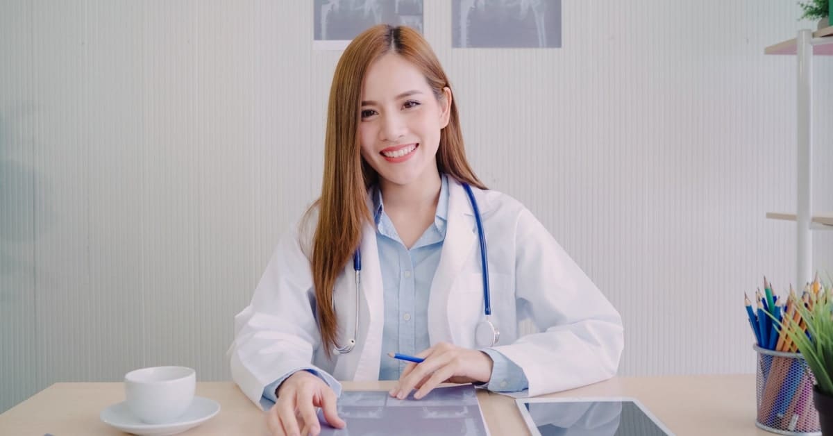 Asian Woman Physician Smiling