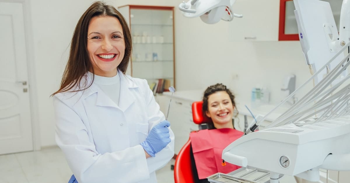Dental Professional Smiling with Patient