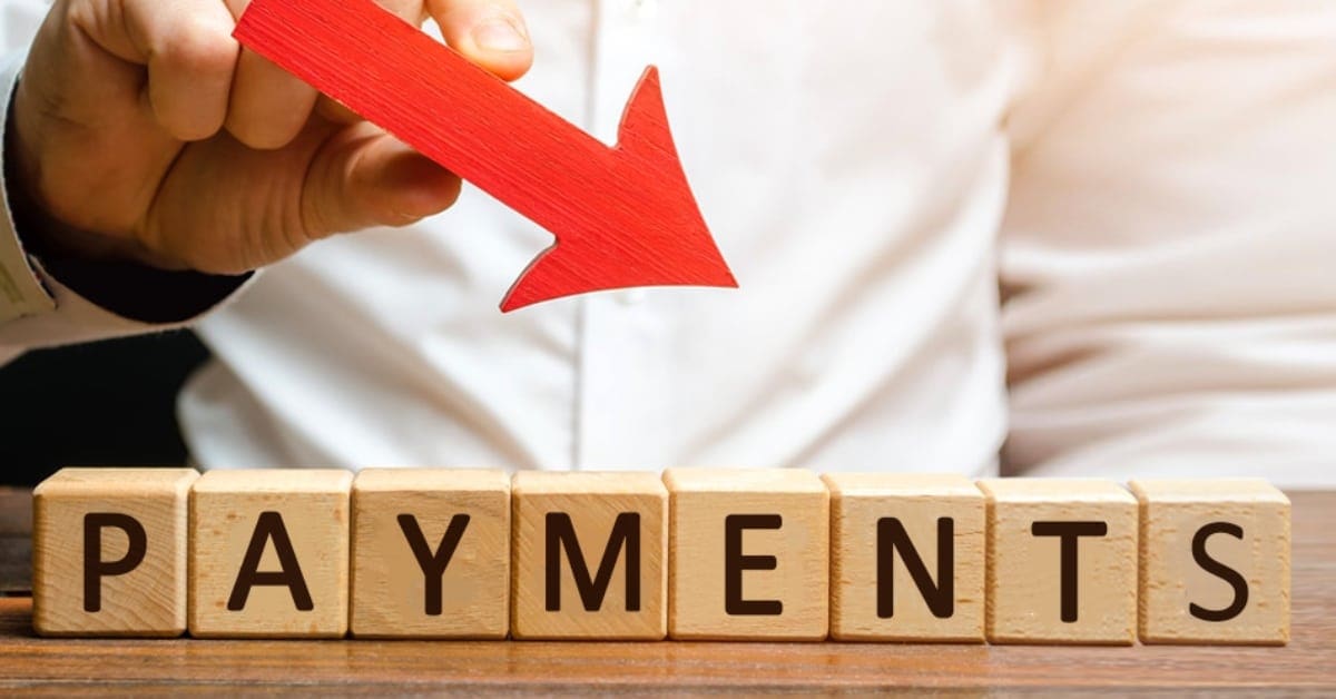 Wooden Blocks Spelling Out Payments