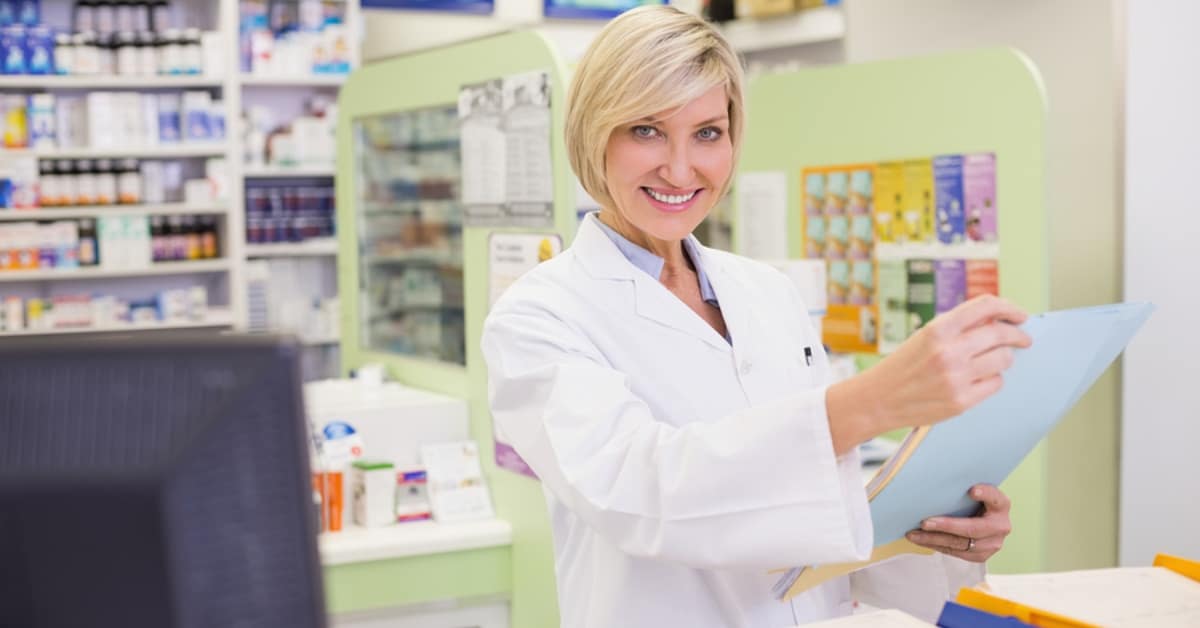 Woman in Pharmacy Smiling Posing