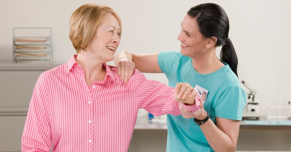 Physical Therapist Working with Woman