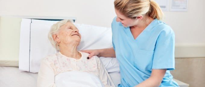 Nurse Caring for Elderly Woman