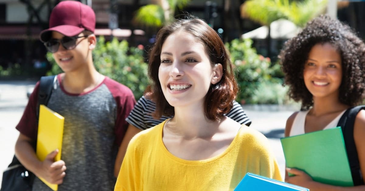 Smiling Group of People on College Campus