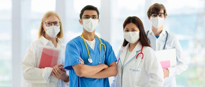 Group of Medical Professionals with Masks on