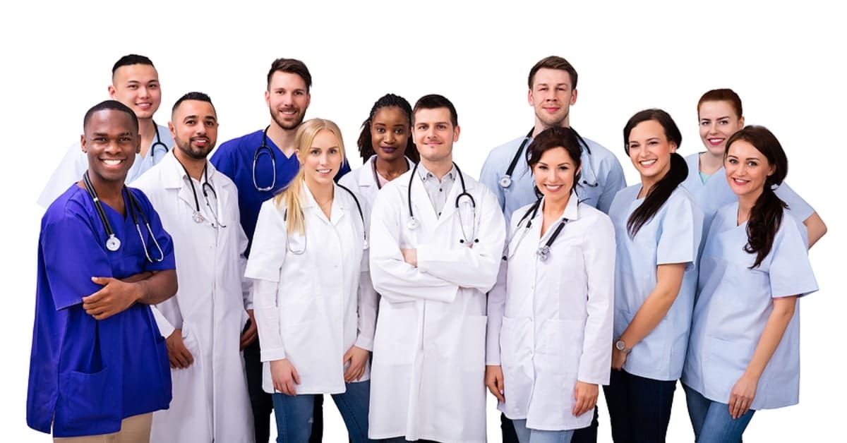 Large Group of Dentists and Dental Assistants Smiling for Picture