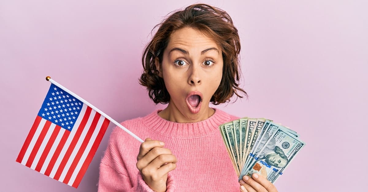 Woman with Surprised Face Holding Cash and an American Flag