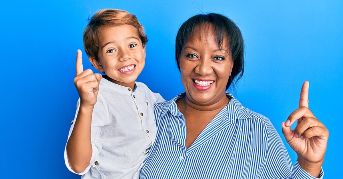 Mother and Young son with Number One Signs