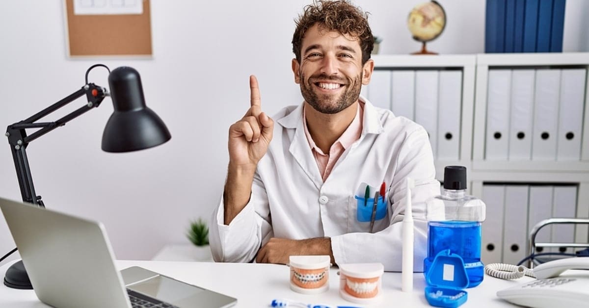 Man Posing Holding Number One Finger Up Smiling