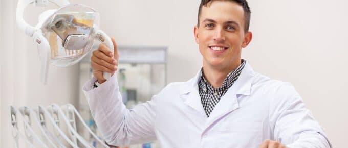 Man in a Medical Setting Posing with Medical Equipment