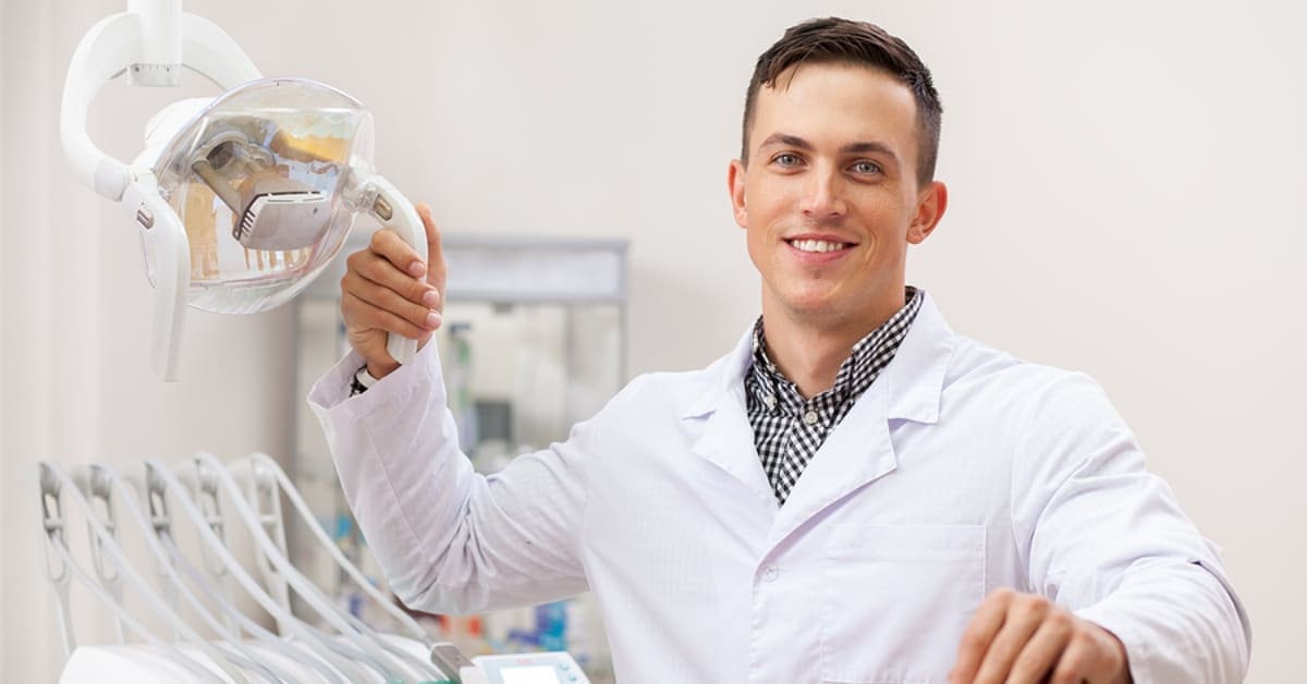 Man in a Medical Setting Posing with Medical Equipment