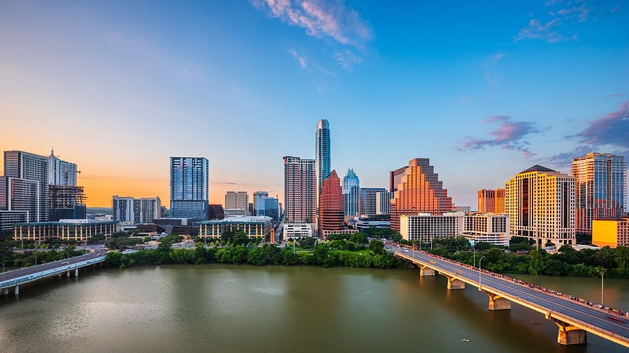 Austin, Texas, USA downtown city skyline on the Colorado River at dusk.