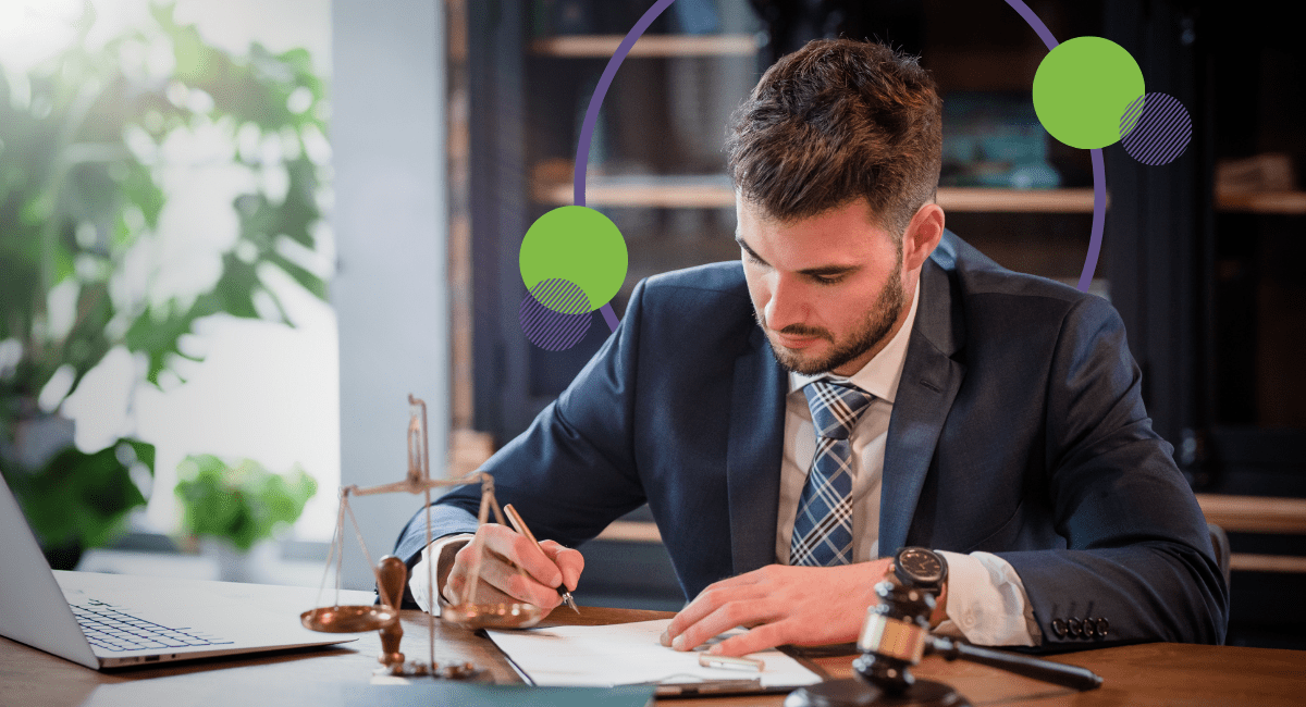 attorney signing papers in his office