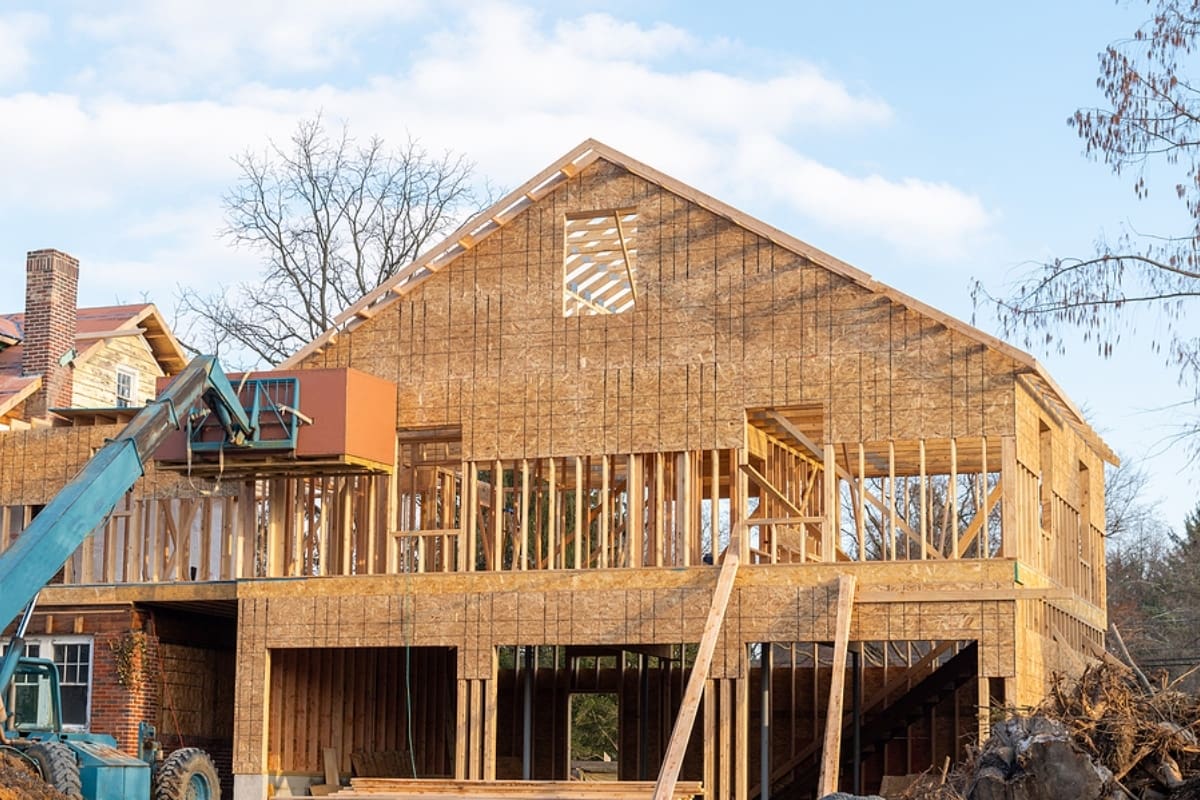 Framed new construction of a house plywood roof.