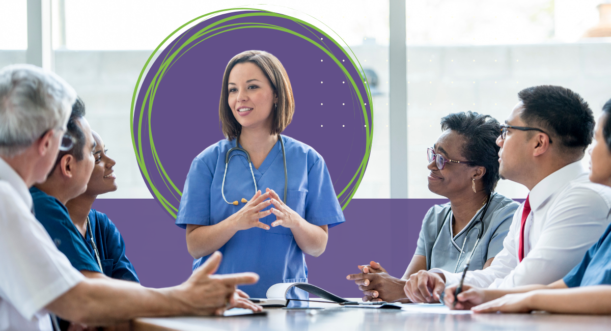 female physician having a meeting with hospital staff