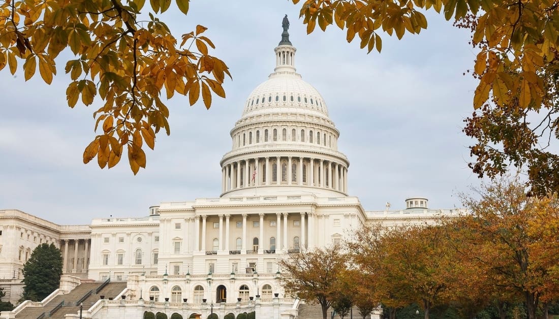 United States Capitol Building at sunset with autumn foliage, Capitol Hill, Washington DC