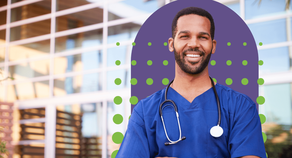 male healthcare worker with stethoscope, arms crossed and smiling proudly