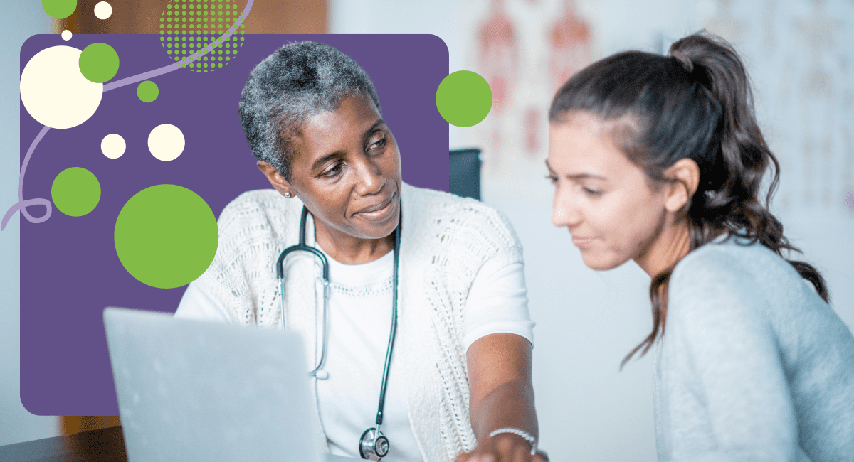 female physician talking to a patient in office