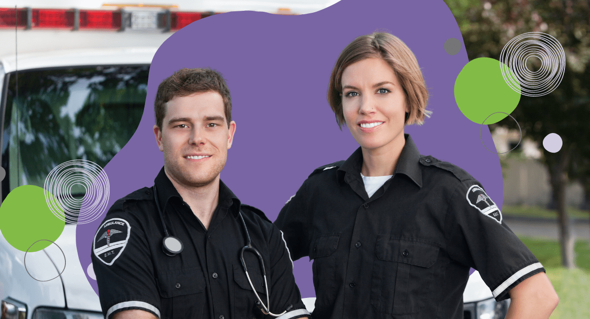 Two first responders standing in front of an ambulance