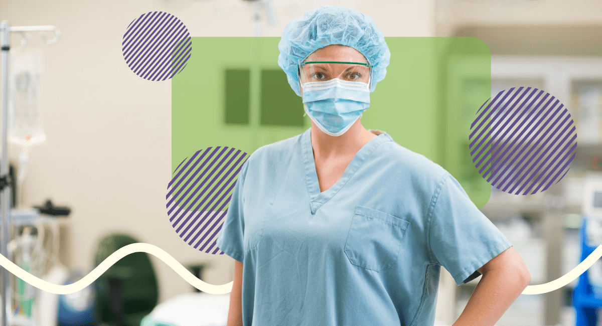female nurse practitioner standing proud, in a hospital setting, wearing eye shield and mask