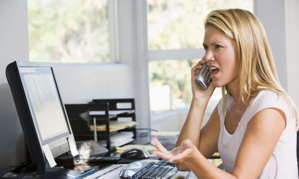 Woman sat working in home office