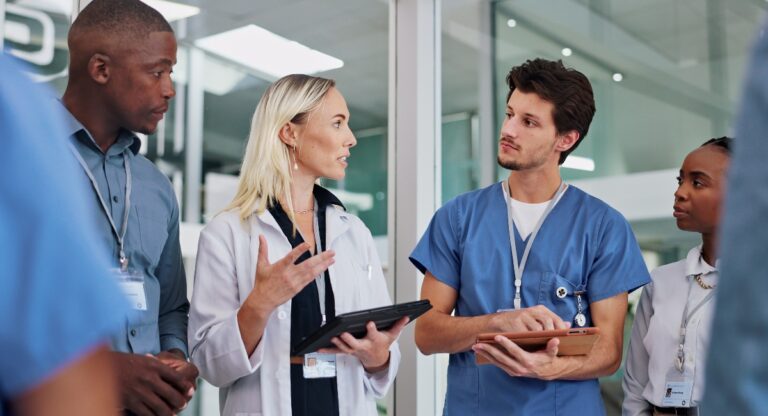 Doctors and nurses in hospital talking